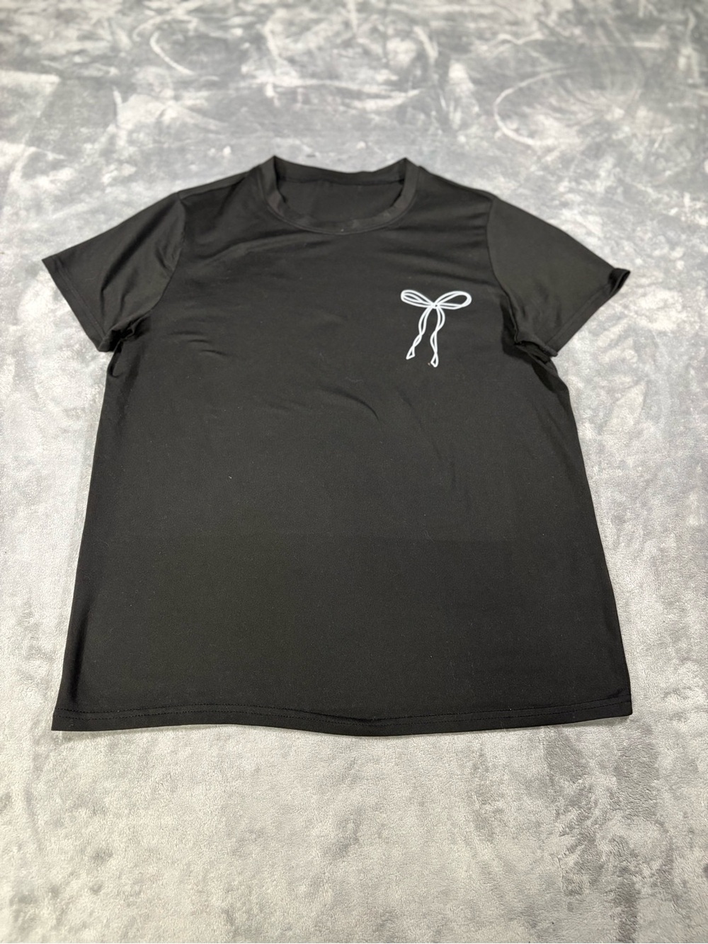 Women’s Black Short-Sleeve Crewneck Tee with Bow Chest Graphic